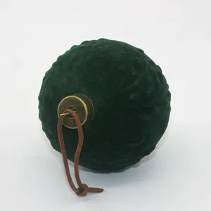 This product is made using a traditional glass blowing process. The flocking is applied after the glass has been blown and cooled, giving it a unique and textured finish.