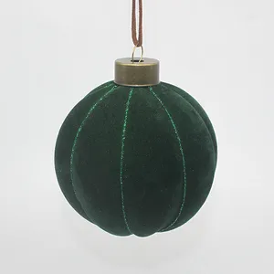 This product is made of glass and is covered in a soft, velvety flocking. It's a beautiful and elegant addition to any Christmas tree.