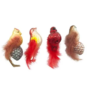 This bird ornament is made from hand-blown glass, with feathers and a shiny finish. This product is a great addition to your Christmas tree.