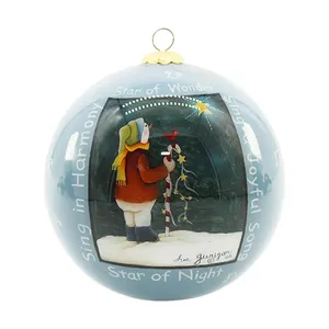 This product is a charming Christmas ornament featuring a hand-painted design of a snowman gazing at a star with a festive red cardinal and a whimsical candy cane tree. The delicate artwork adds a touch of handmade elegance to your holiday décor.