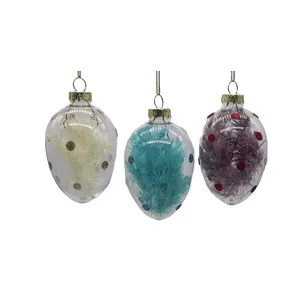 These ornaments are made using a variety of glassblowing techniques, which give them a unique and artisanal look. They are perfect for adding a touch of handmade charm to your home.