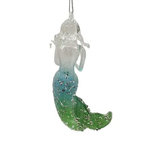 This product is a whimsical mermaid-shaped Christmas ornament that adds a touch of fantasy and elegance to your holiday décor.