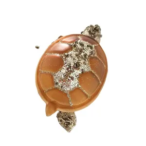 This product is a whimsical and charming addition to any holiday décor. The sea turtle design is both classic and trendy, and the golden glitter adds a touch of elegance.