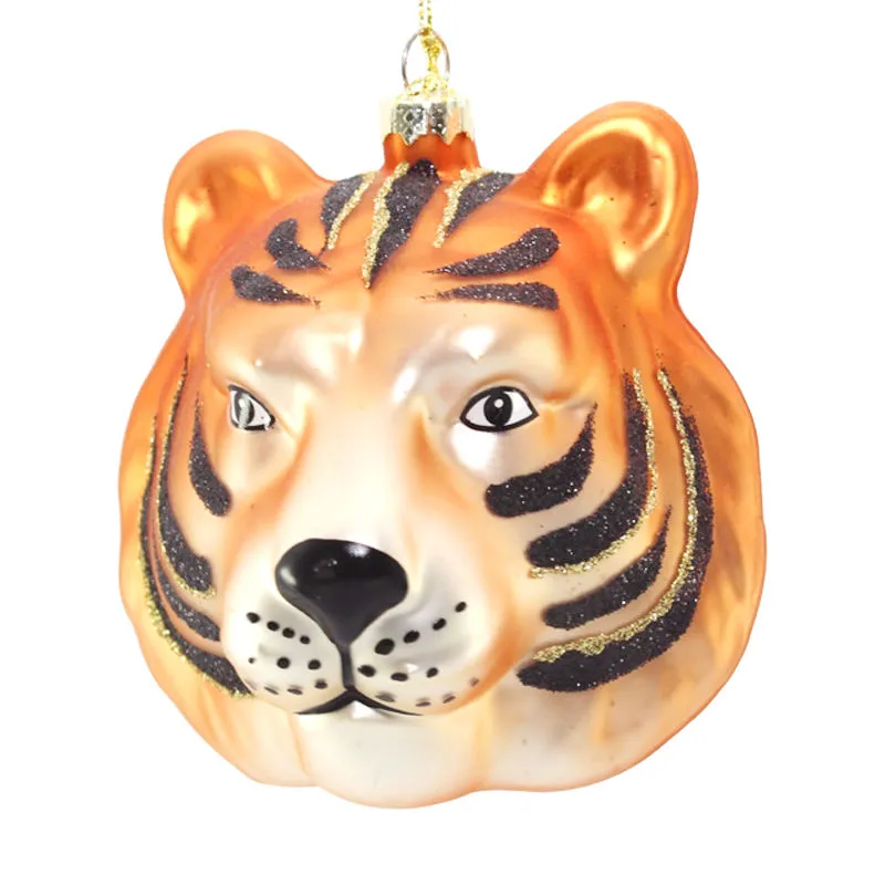 This product is a tiger head Christmas ornament, crafted from glass and adorned with black stripes and glitter. It's ideal for wholesale purchases and can be customized to meet your specific needs.