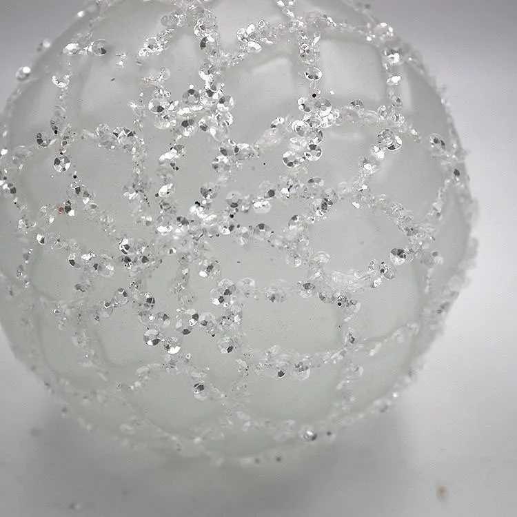 These Christmas ornaments are made of blown glass and then decorated with beads and glitter.