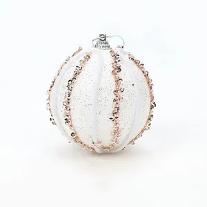 This product is made of foam with glitter and white stripes details.